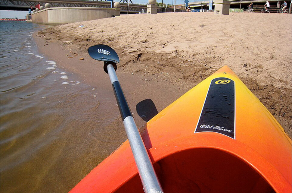 Kayak pulled up to the Tempe Town Lake beach